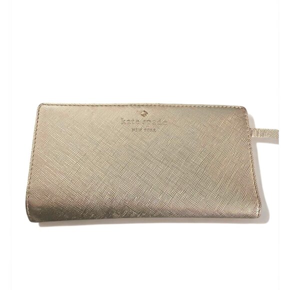kate spade Handbags - KATE SPADE ROSE GOLD SLI BIFOLD WALLET SAFFIANO LEATHER WALLET
